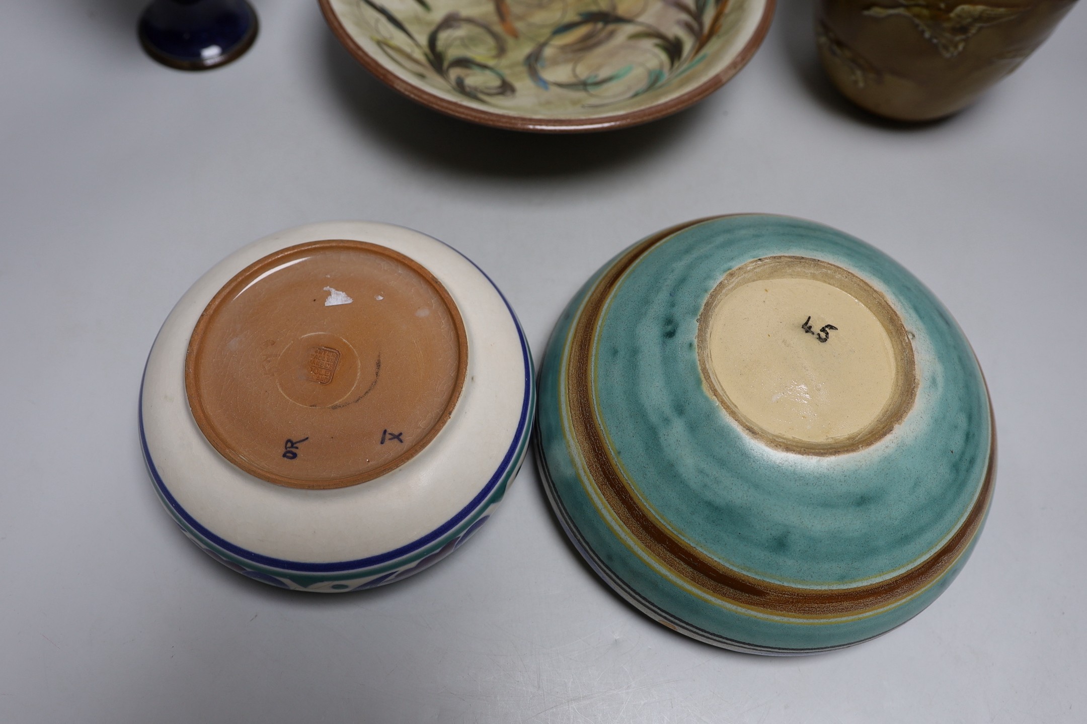 A Doulton stoneware vase and jug, tallest 28cm, together with three art ceramic bowls